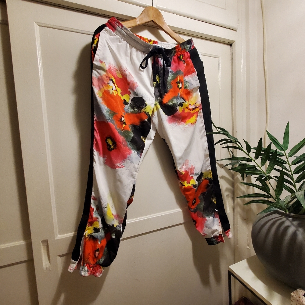 Pam & Gela White Track Joggers with Red, Yellow & Black Floral Print